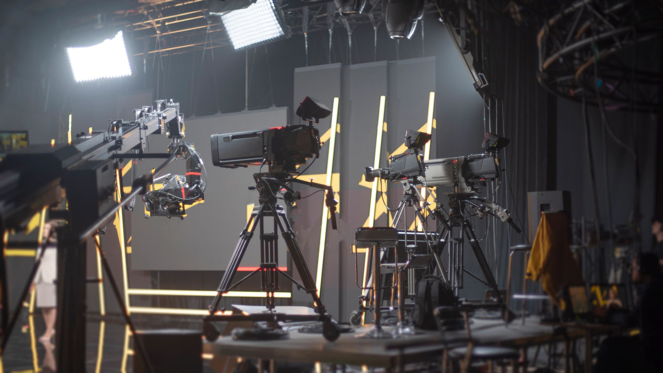 Professional live news studio with cameras and lighting